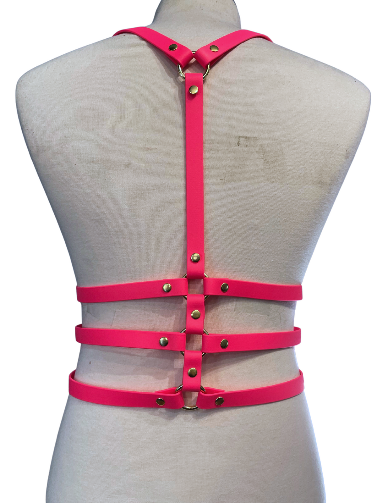 Back view of neon pink vegan leather harness 